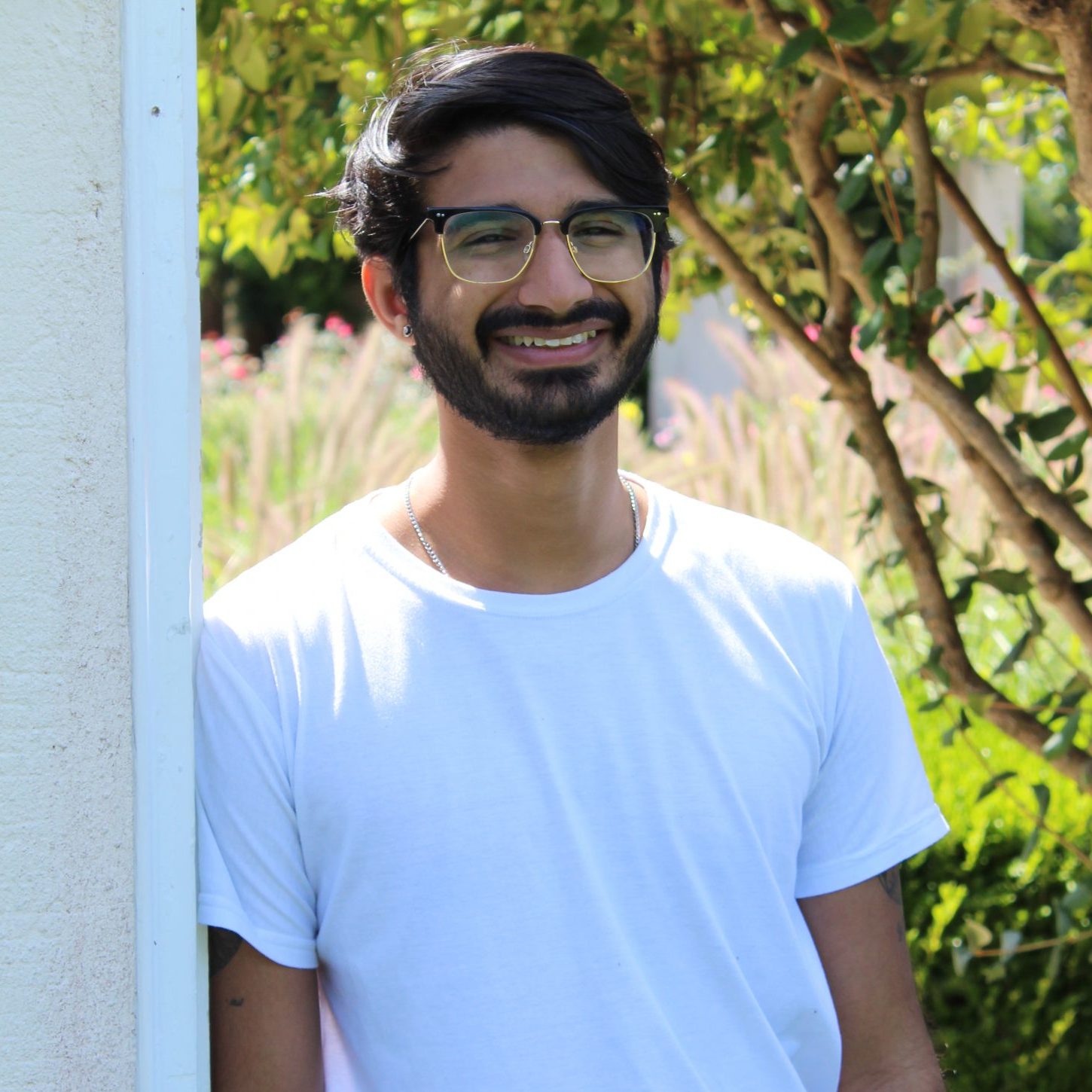 Ammar in an entryway to Blithewood's Garden